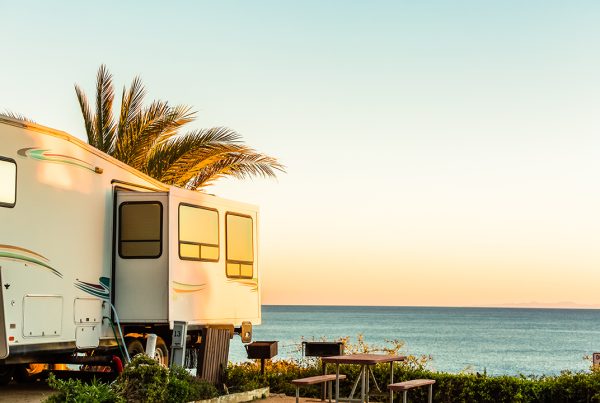 a camper parked in florida by the sea